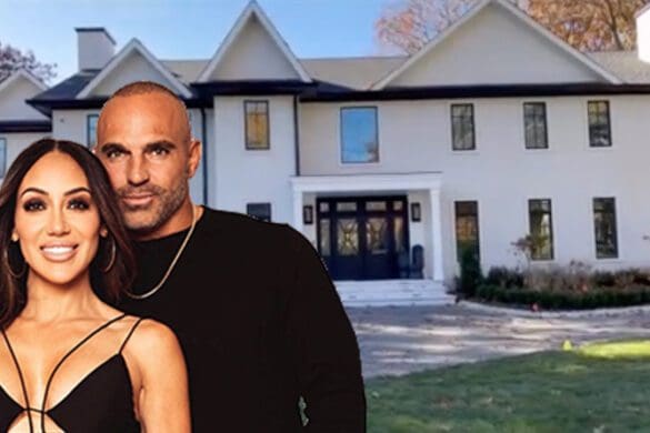 Melissa and Joe Gorga pose in front of their new Franklin Lakes home