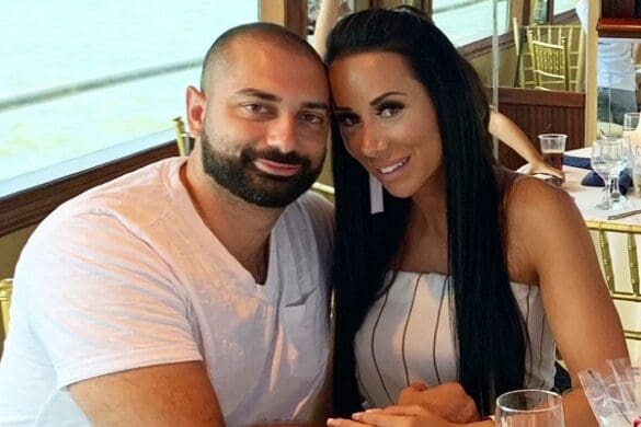 John Fuda and Rachel Fuda smiling for a photo on date night