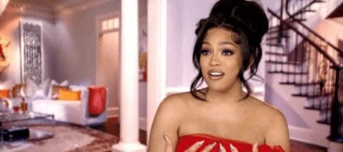 Drew Sidora wears a red strapless dress in RHOA season 15 confessional interview