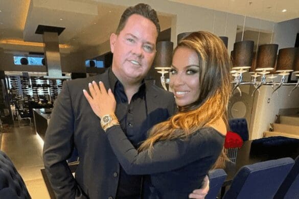 Dolores Catania Paulie Connell pose for photo in all black outfits on date night