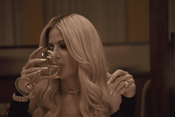 RHOA OG Kim Zolciak drinking wine while appearing on a recent episode