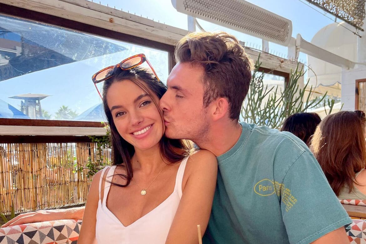 james-kennedy-ally-lewber-relationship-abuse-vanderpump-rules James Kennedy kisses girlfriend Ally Lewber on the cheek while taking a cute couple's photo.